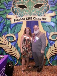 Florida CRB Chapter members Honoara and Ric Giumenta were just a few who had their picture taken in front of the colorful Chapter booth.